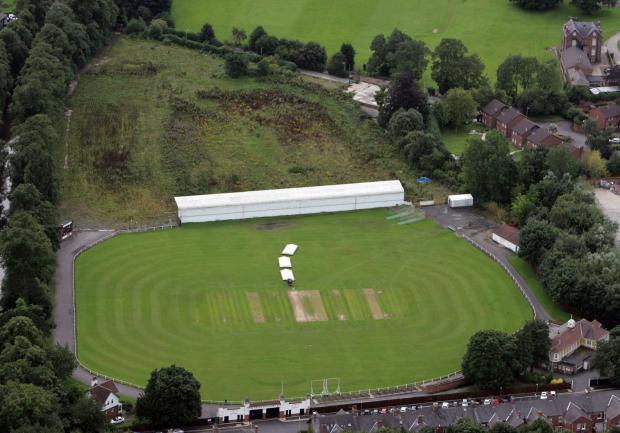 The Northern Echo: An aerial shot of Feethams showing the cricket ground in the centre with the overgrown site of the football ground at the top. At the bottom of the picture are the "twin towers", shortly before their demolition in 2013